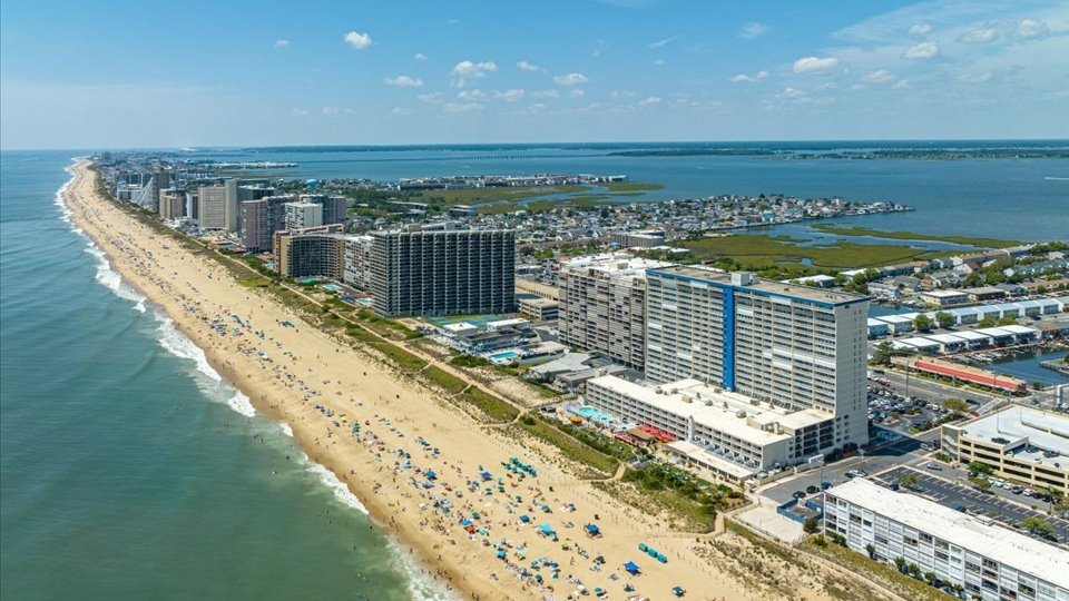 Ocean City Condos has beachfront condos shown here at the Carousel, Sea Watch, Golden Sands.  Not visible  in the 
photo are our Parrot Bay Townhouses by the Boardwalk.
Weekly and weekend rentals available for couples, families, and groups.  